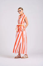 Load image into Gallery viewer, Woman wearing an orange and white striped dress on a white background