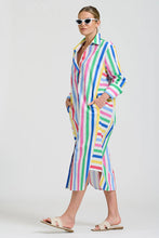 Load image into Gallery viewer, Woman wearing a colorful striped shirt dress on a white background