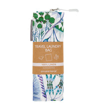 Load image into Gallery viewer, Travel laundry bag with botanical design and brown label on a white background