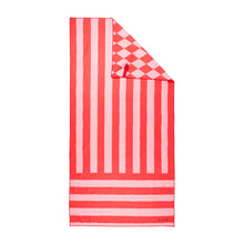 Load image into Gallery viewer, Picture of red and pink striped sand-free towel unrolled on a white background, the corner shows that the reverse is a diamond pattern.