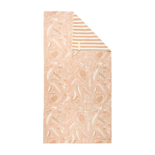 Load image into Gallery viewer, Picture of tan floral sand-free towel unrolled on a white background, the corner shows that the reverse is a tan and darker tan striped pattern.