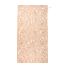 Load image into Gallery viewer, Picture of tan floral sand-free towel unrolled on a white background.