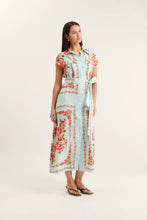 Load image into Gallery viewer, Woman wearing a floral dress on a white background