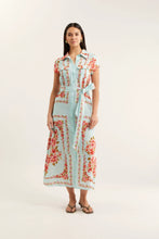 Load image into Gallery viewer, Woman wearing a floral dress with a light blue collar on a white background